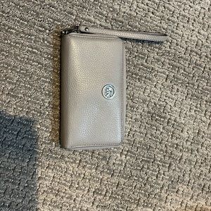 Michael Kors zipper wristlet wallet, pebble leather in pearl gray.
